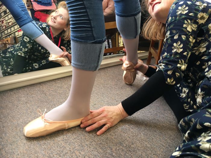 Photo of Britt fitting shoes