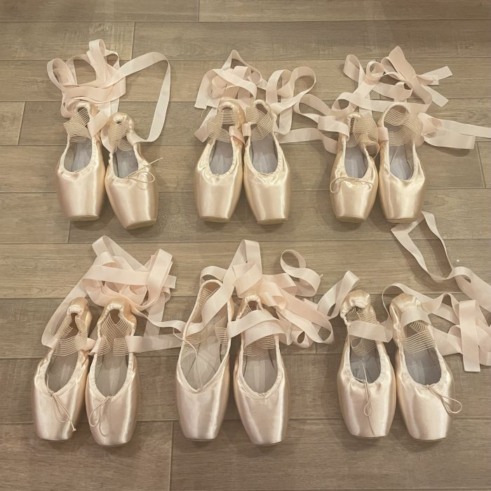 Photo of 6 pairs of darned shoes