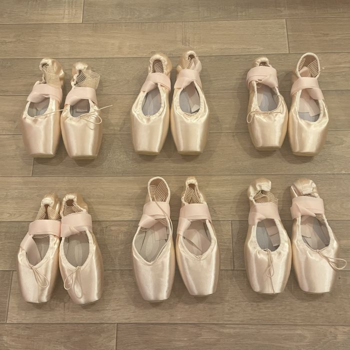 Photo of 6 pairs of wrapped shoes